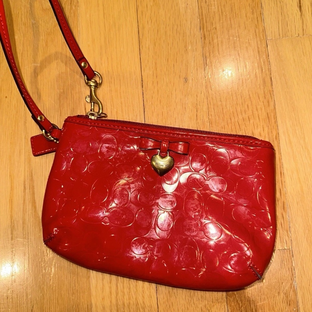 Coach Red Embossed Wristlet with Heart Charm